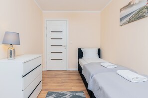 2 habitaciones, tabla de planchar con plancha, wifi y ropa de cama 