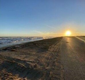 Drive along the scenic coastal road, taking in the breathtaking views of the open landscape.