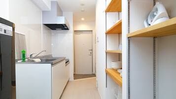 Fridge, microwave, stovetop, cookware/dishes/utensils