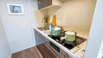 Fridge, microwave, stovetop, cookware/dishes/utensils