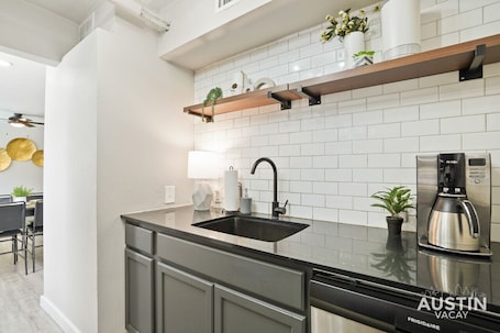 Fridge, microwave, oven, stovetop. Walk to Restaurants or Cook in Subway Tile Kitchen