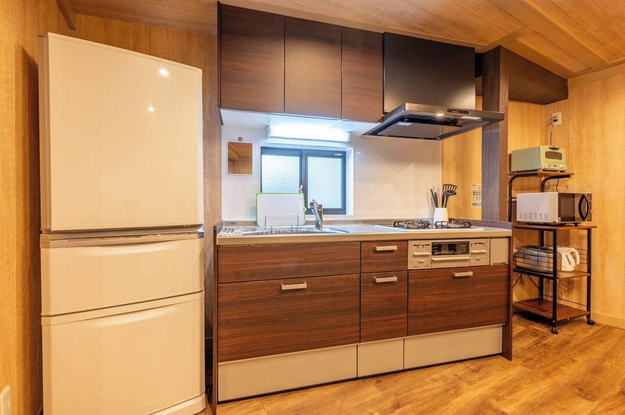 Fridge, microwave, stovetop, cookware/dishes/utensils