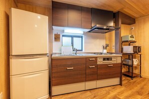 Fridge, microwave, stovetop, cookware/dishes/utensils