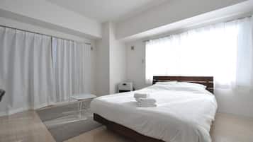 1 室のベッドルーム、デスク、WiFi (無料)、ベッドシーツ