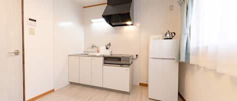 Fridge, microwave, stovetop, cookware/dishes/utensils