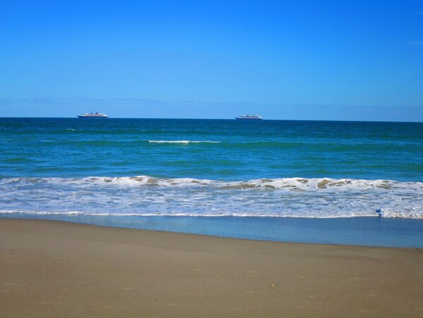 On the beach, sun-loungers, beach towels