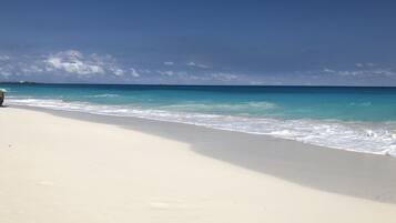 On the beach, sun-loungers, beach towels