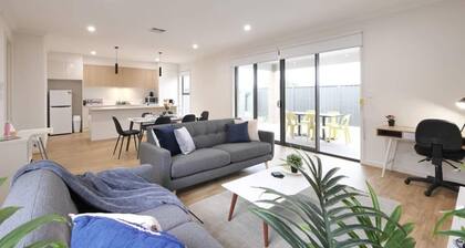 FEEL HAPPY & AT HOME HERE. No stairs. Modern. Ducted A/C. Secure double garage.