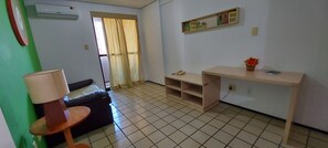 Apartamento superluxo | Sala de estar | TV de tela plana