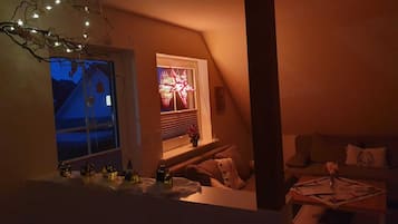 Televisión, reproductor de DVD, libros