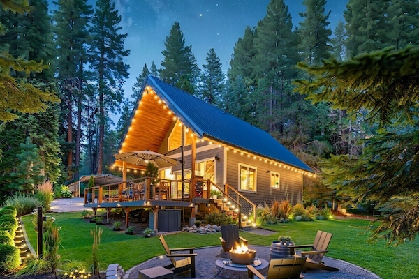 The stars are out, the fire's warm and the pines rise like guardians of the sky.