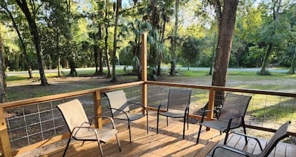 1-1/2 acre Park like wooded setting. Clean 3/2 with plenty of parking.