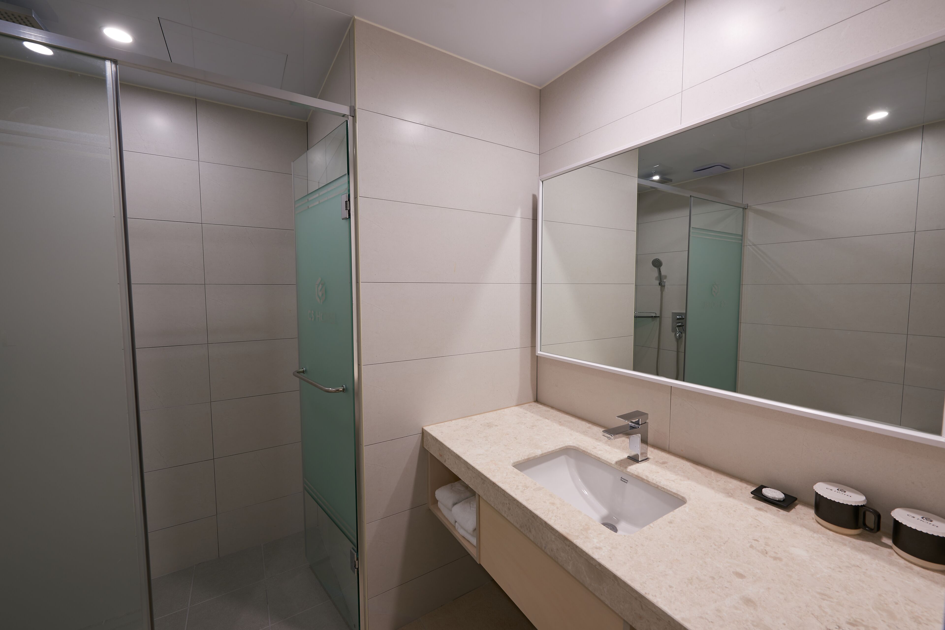 hair dryer, bathrobes, slippers, bidet