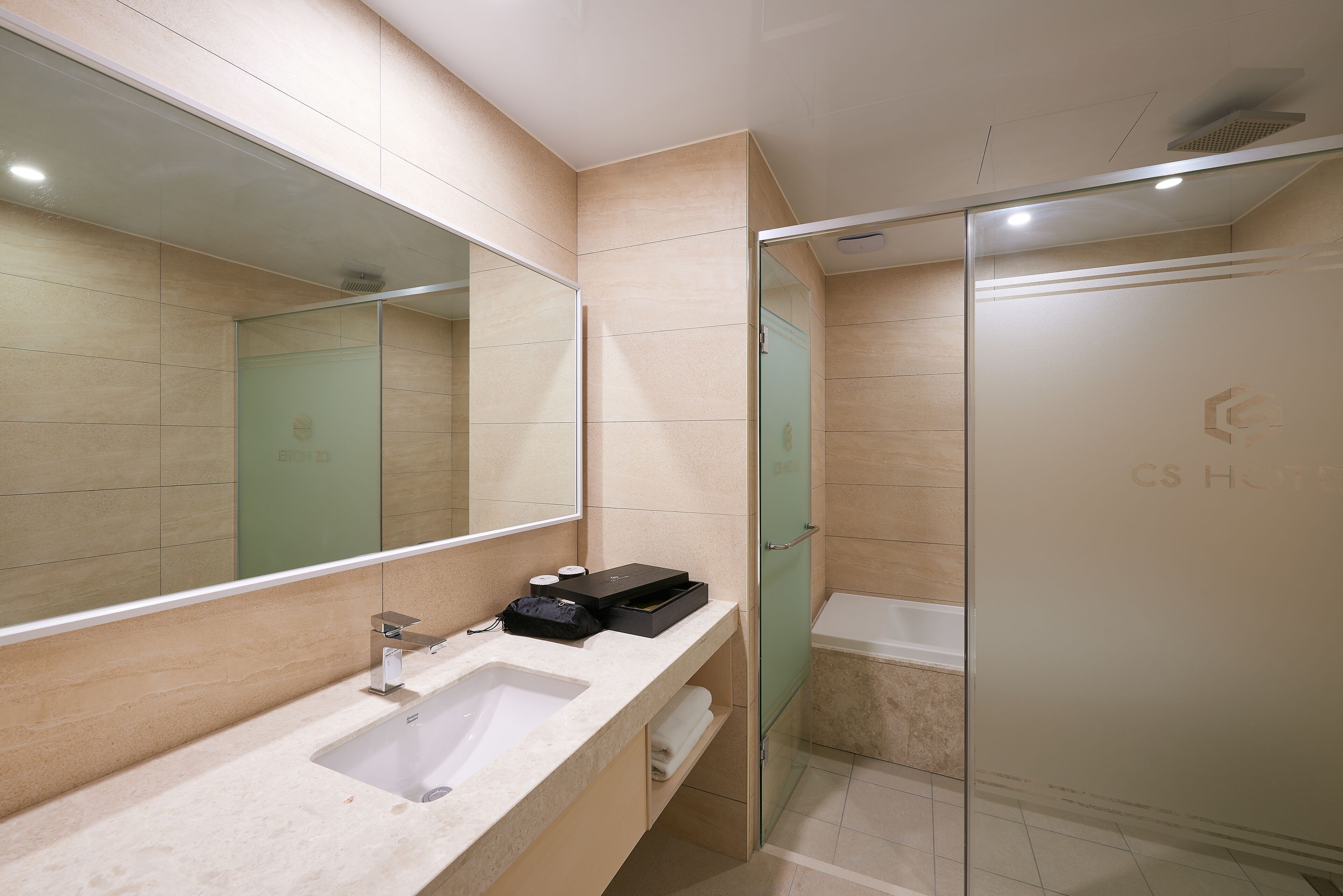 hair dryer, bathrobes, slippers, bidet