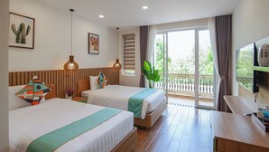 A hotel room with two beds, a balcony, a TV, and a desk. -  The View Hotel (Cam Lam)