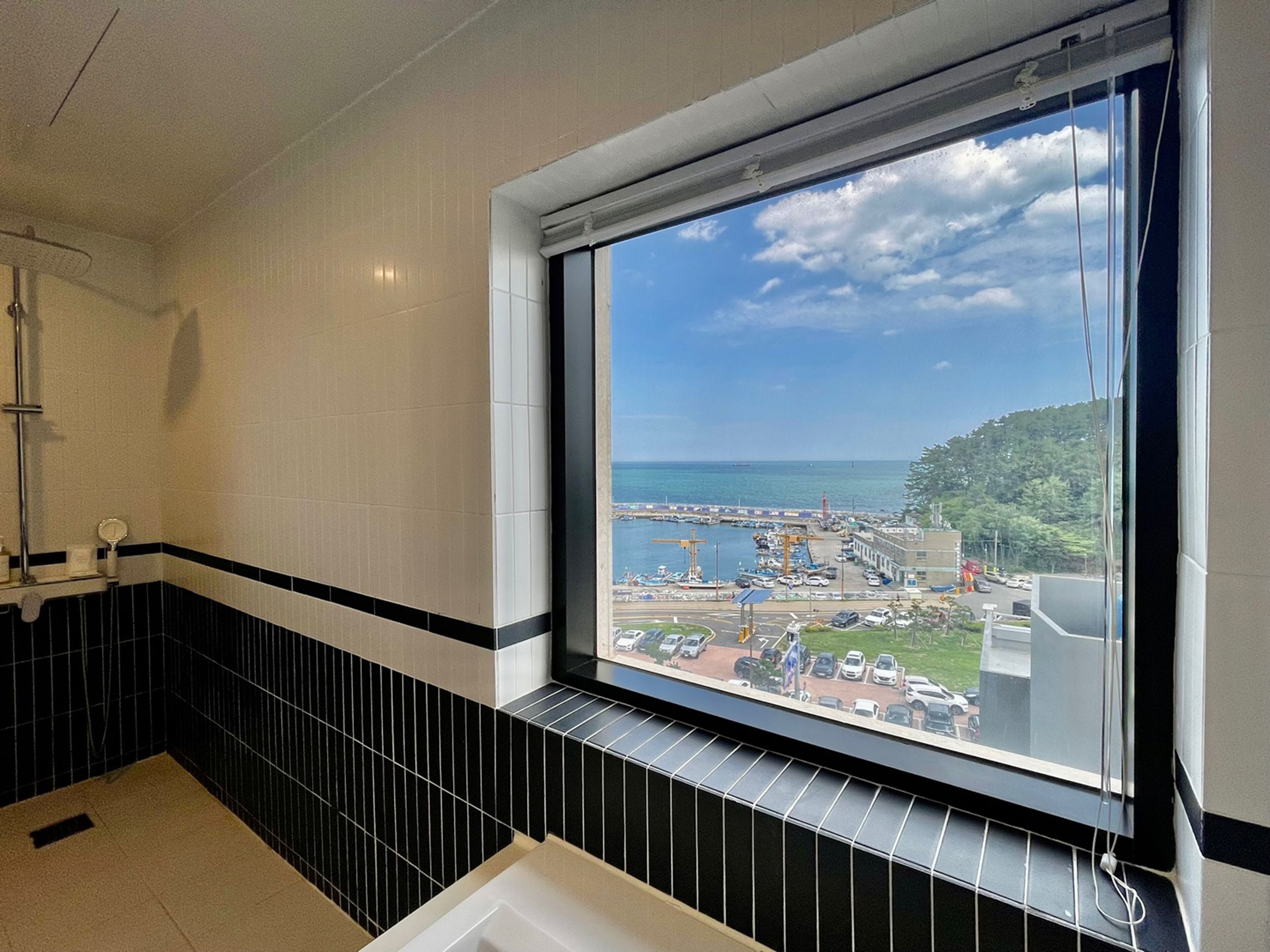 junior suite | bathroom | designer toiletries, hair dryer, bathrobes, slippers