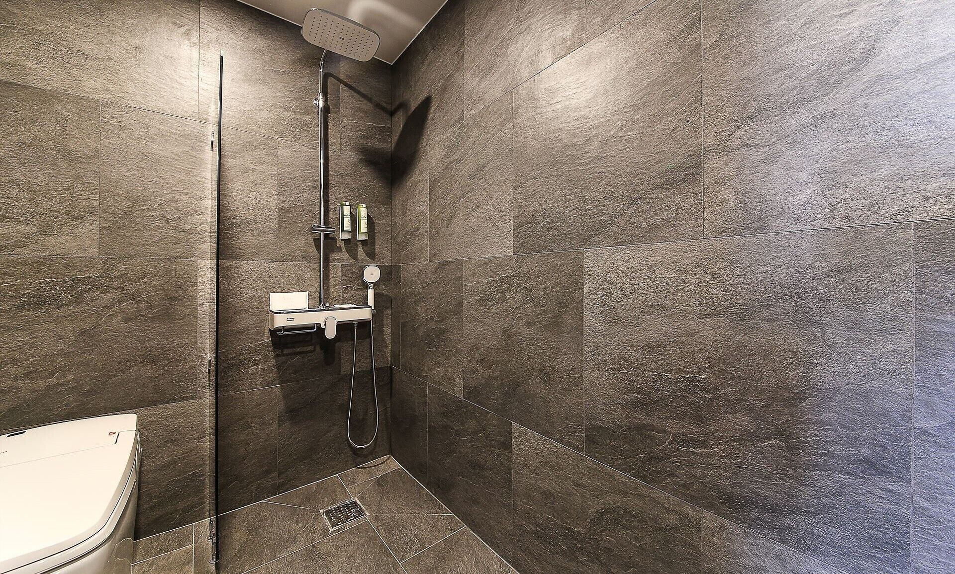 superior double room | bathroom | designer toiletries, hair dryer, bathrobes, slippers