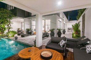 Deluxe Villa, 4 Bedrooms | Living area | 60-inch LCD TV with cable channels, TV, Netflix - Villa Jemma Canggu (Canggu)