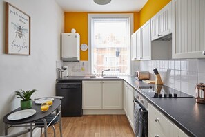 Apartment | Private kitchen | Full-size fridge, microwave, oven, stovetop