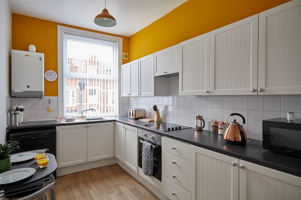 Apartment | Private kitchen | Full-size fridge, microwave, oven, stovetop