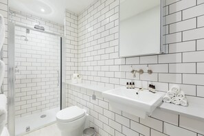 Lägenhet Superior | Badrum | Gratis toalettartiklar, hårtork, handdukar och tvål