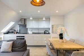 Two Bedroom Standard Apartment | Living area | Flat-screen TV - Urban Chic - Rathbone (London)