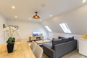 Two Bedroom Standard Apartment | Living area | Flat-screen TV - Urban Chic - Rathbone (London)