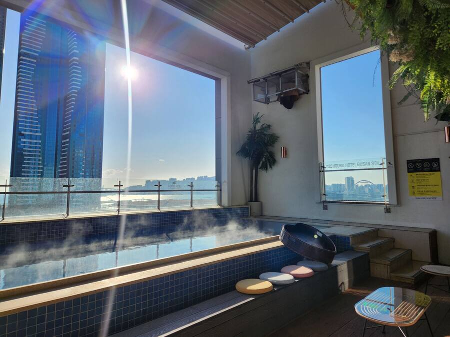 Outdoor pool, open 7:00 AM to midnight, pool umbrellas, sun loungers
