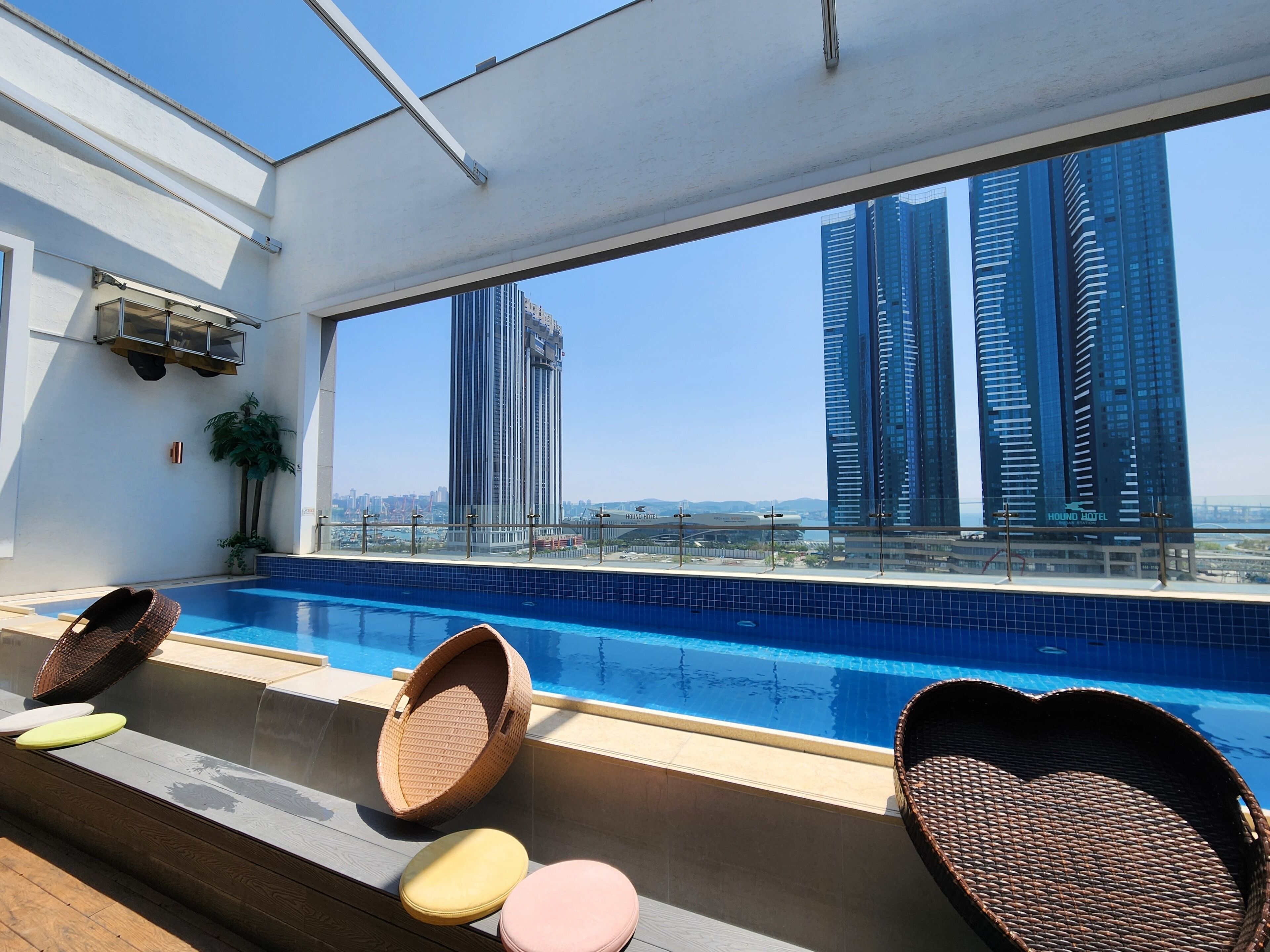 outdoor pool, open 7:00 am to midnight, pool umbrellas, pool loungers