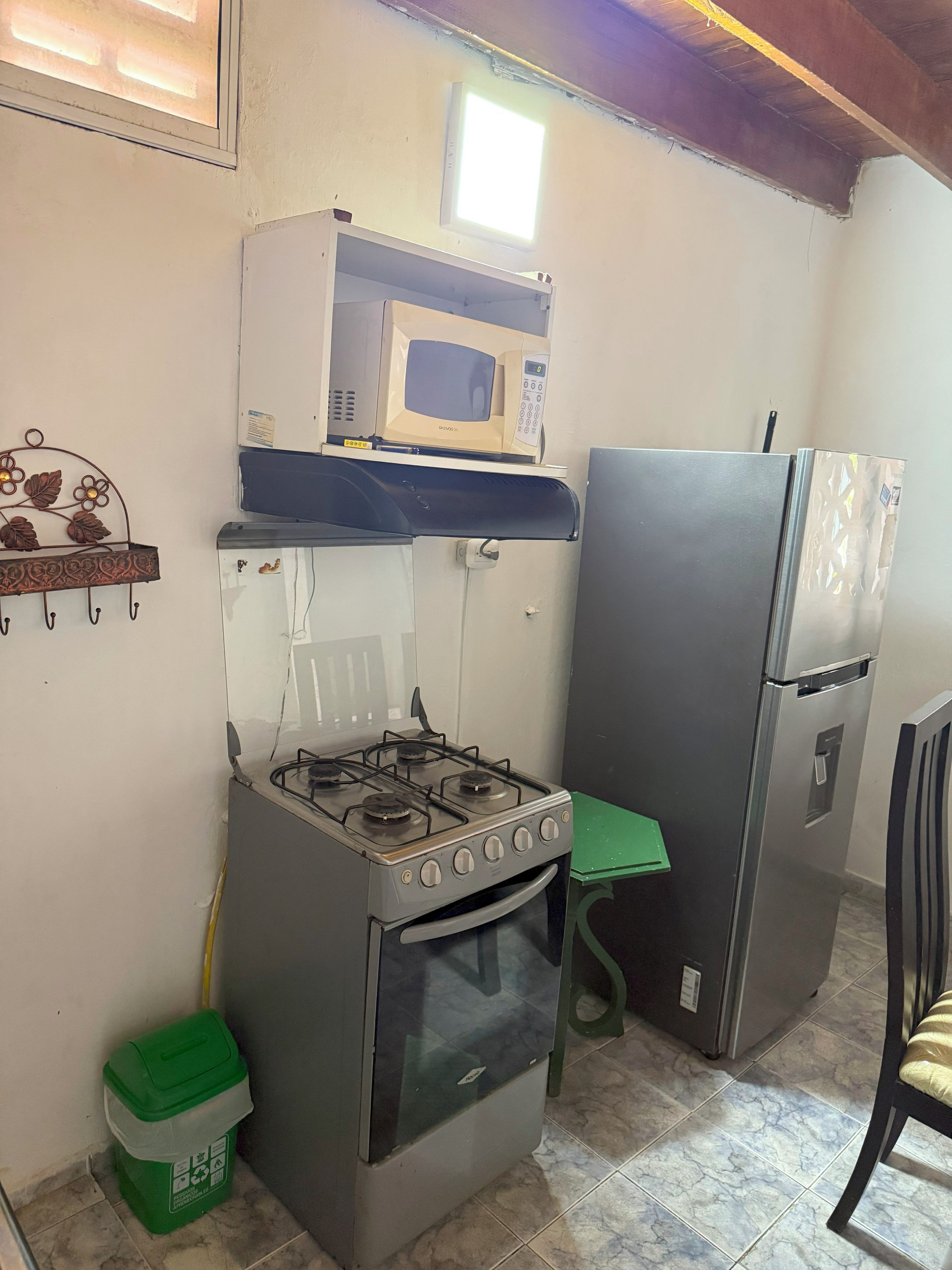Coffee/tea maker, fridge, microwave, oven