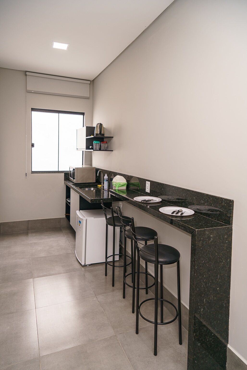 Fridge, electric kettle, cookware/dishes/utensils