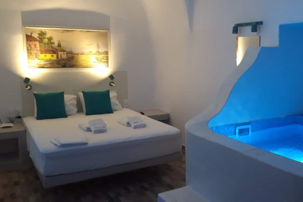 Traditioneel huis, 1 slaapkamer, hot tub | 1 slaapkamer, een kluis op de kamer, individueel gedecoreerd