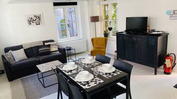 Classic Apartment, 1 Double Bed with Sofa bed | Living area | Flat-screen TV