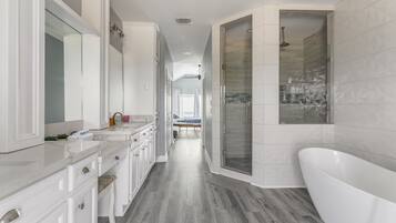 Combined shower/tub, hair dryer, towels, soap