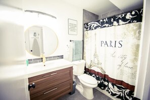 Combined shower/tub, hair dryer, towels, soap