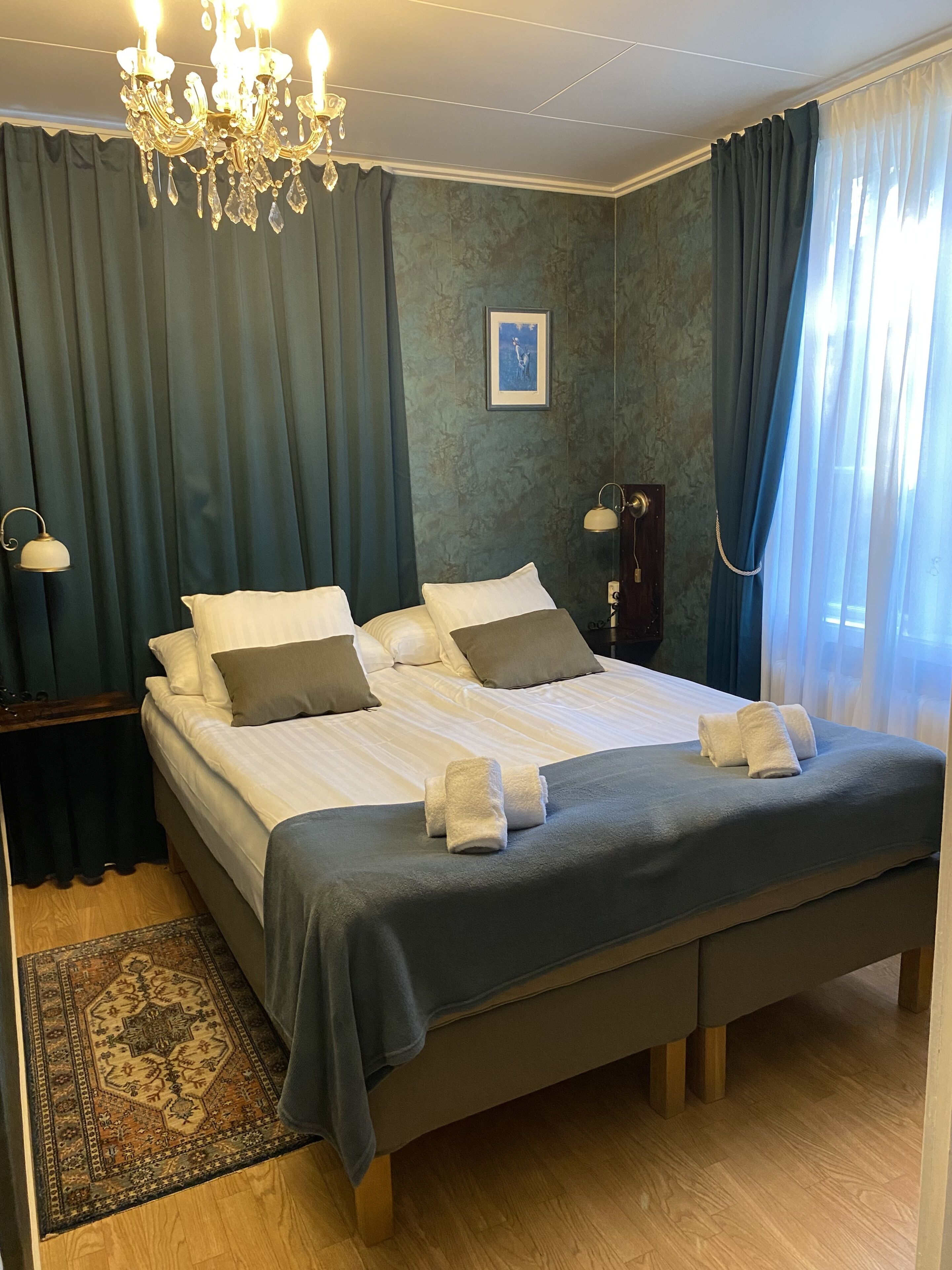 Standard Quadruple Room | Desk, laptop workspace, blackout curtains