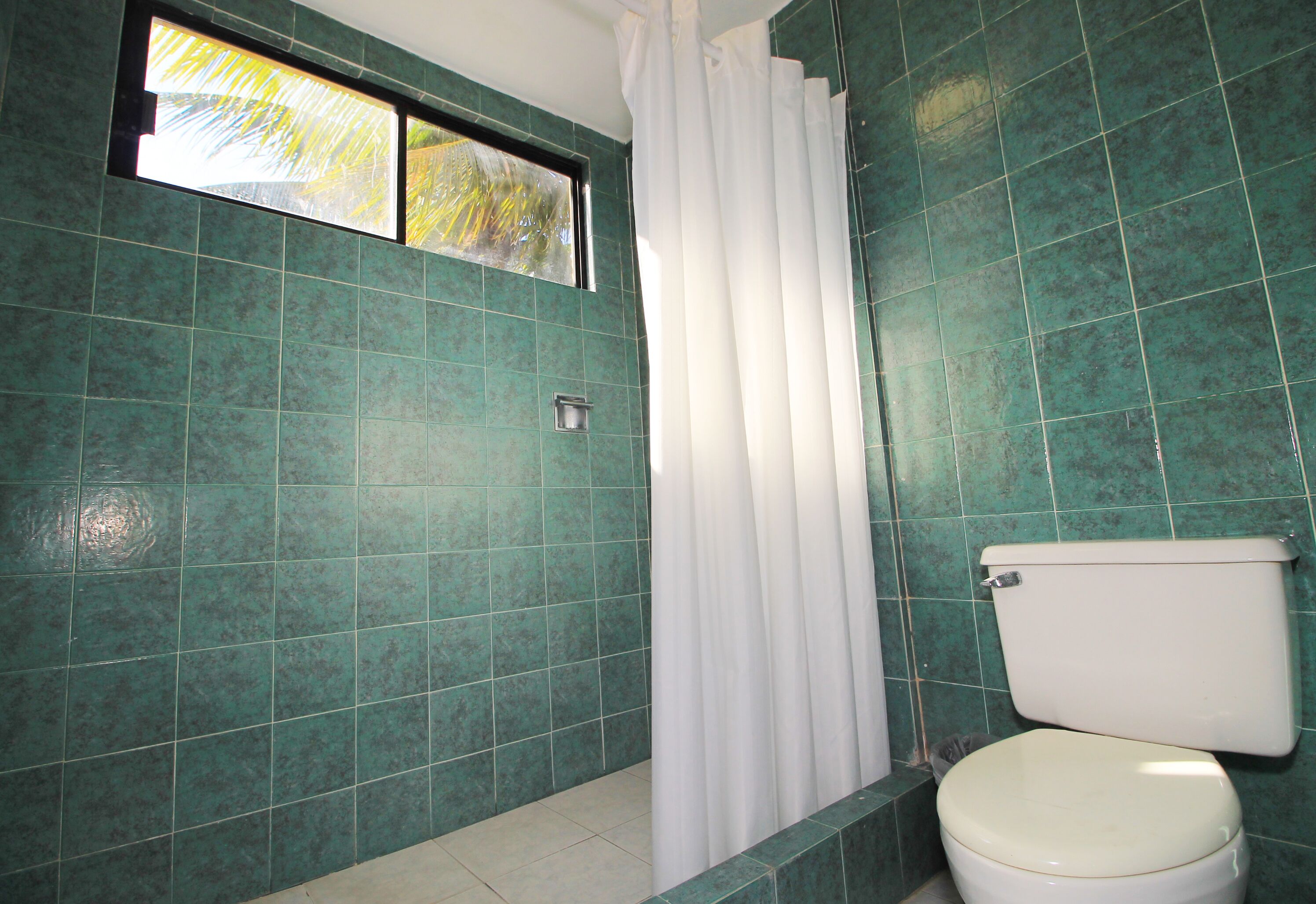 family quadruple room, 2 double beds | bathroom | shower, free toiletries, towels, soap