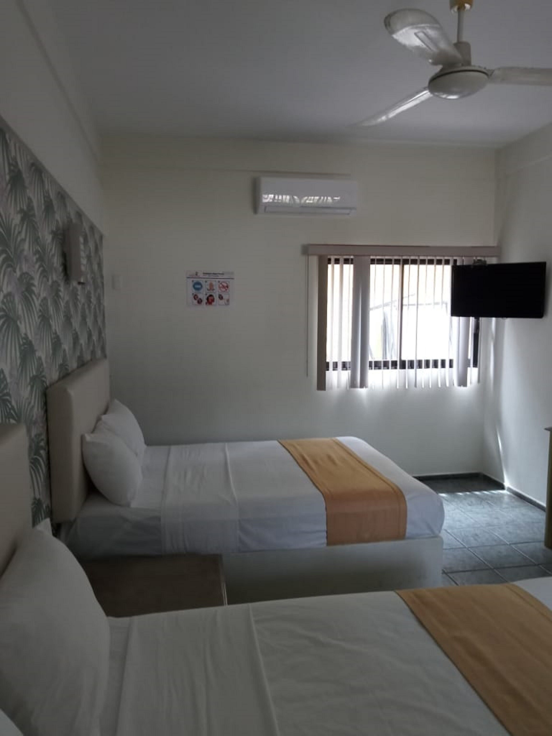 family quadruple room, 2 double beds | desk, iron/ironing board, free wifi, bed sheets