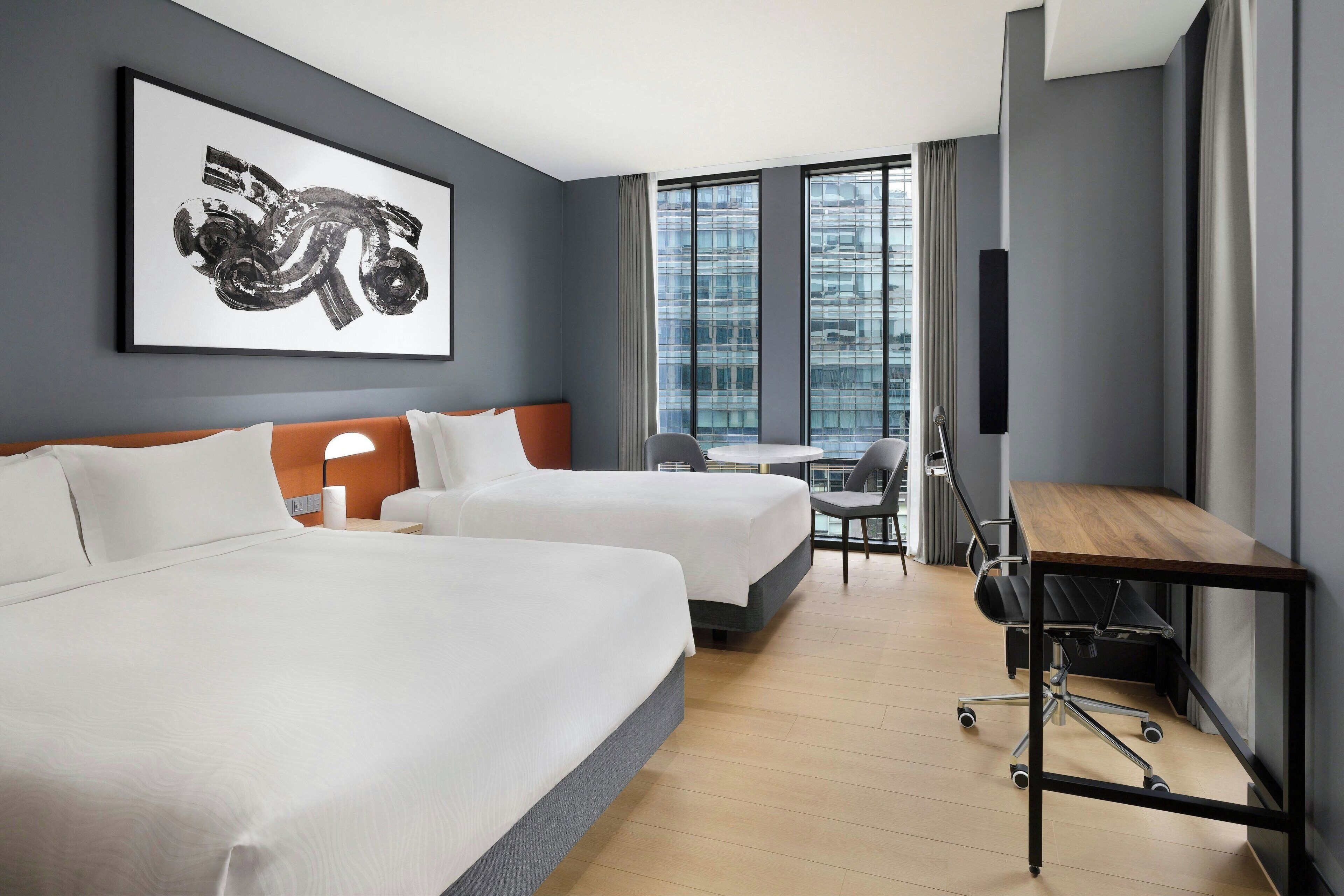 premium bedding, down duvets, minibar, in-room safe