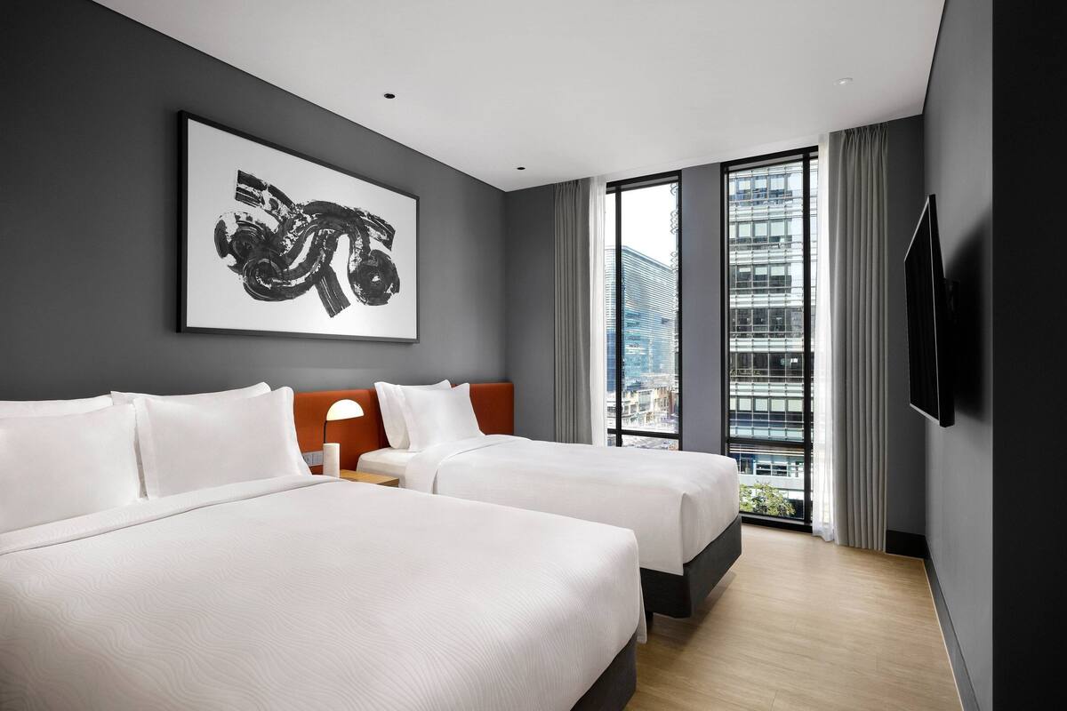 Business Deluxe Family Room | Bộ đồ giường cao cấp, chăn bông, minibar, két bảo mật tại phòng 