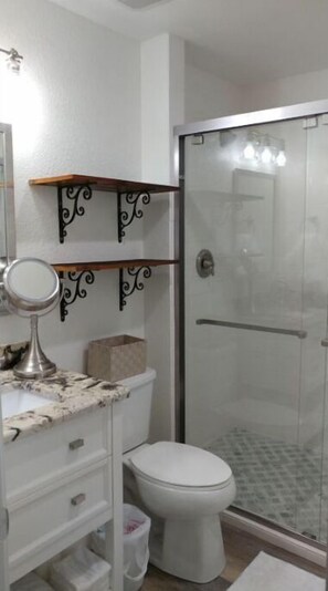 Bathtub, hair dryer, towels, soap