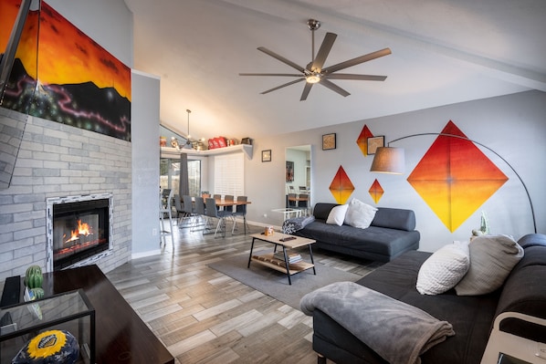 Smart TV, fireplace, books, music library