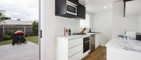 Superior House | Private kitchen | Full-size fridge, microwave, oven, stovetop