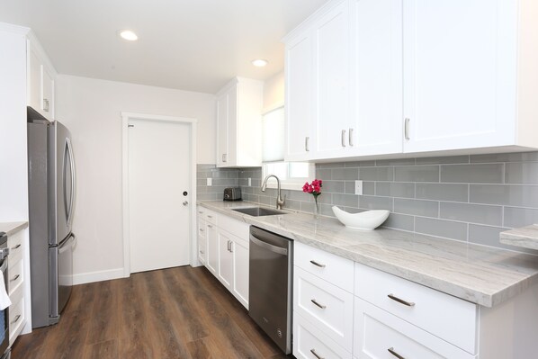 Fridge, microwave, oven, stovetop - One bedroom, new construction in Pacific Beach (San Diego)