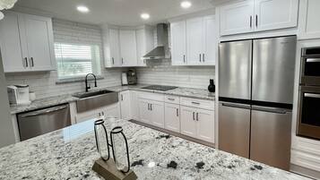 Fridge, dishwasher, cookware/dishes/utensils