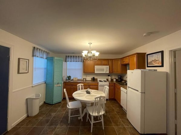 Fridge, coffee/tea maker, cookware/dishes/utensils