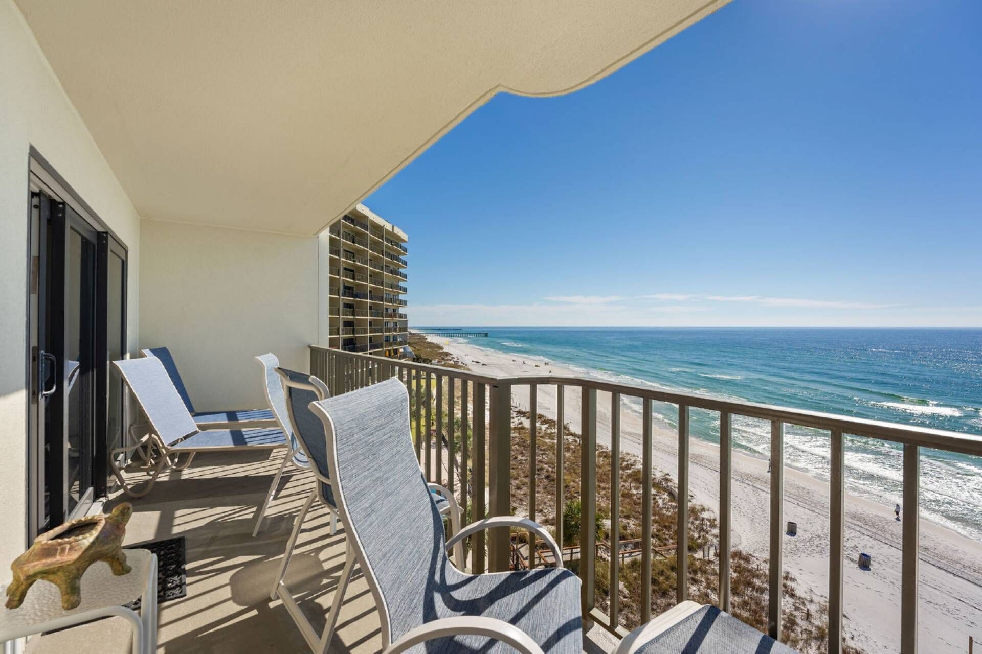 Gulf front corner unit with wraparound balcony in a gated resort with grills and a kiddie pool