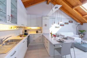 Family Apartment, 1 Bedroom, Lakeside (Blu Lake apartment on Ghiffa Beach) | Private kitchen | Fridge, oven, stovetop, coffee/tea maker
