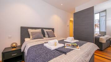 Family Apartment, 2 Bedrooms, 2 Bathrooms (Star of Lugano) | 2 bedrooms, iron/ironing board, bed sheets