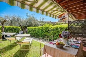 Family Apartment, Multiple Bedrooms (Borgo Degli Ulivi shared pool- 200m) | Outdoor dining